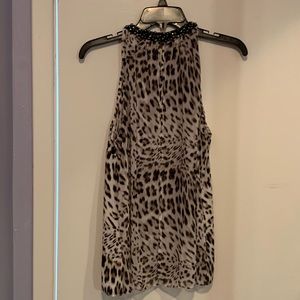 Jennifer Lopez leopard print sleeveless blouse